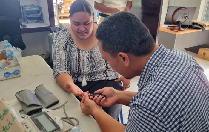 Health checks at Tonga. Blood sugar test.